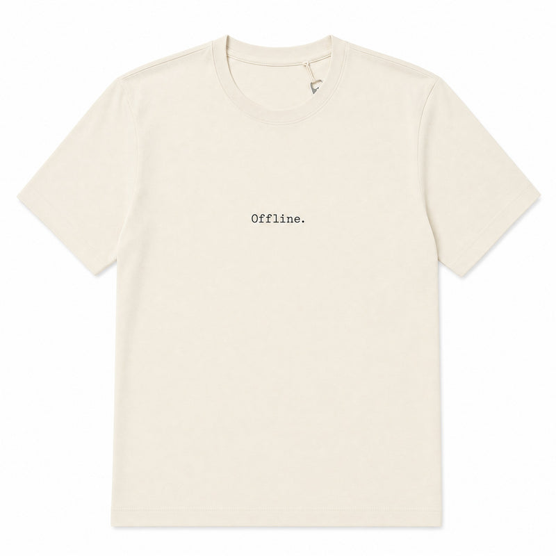 An off-white crewneck t-shirt with the word 'Offline.' printed in a typewriter font on the chest, displayed flat against a white background.