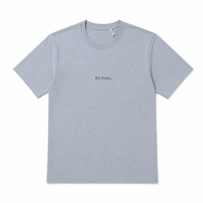 A light gray short-sleeve crewneck t-shirt with the text 'No Chat.' printed in black on the center chest, displayed flat against a white background.
