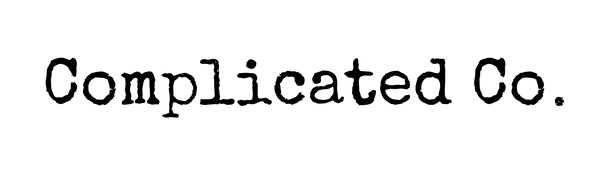 Complicated Co. Logo in typewriter style font