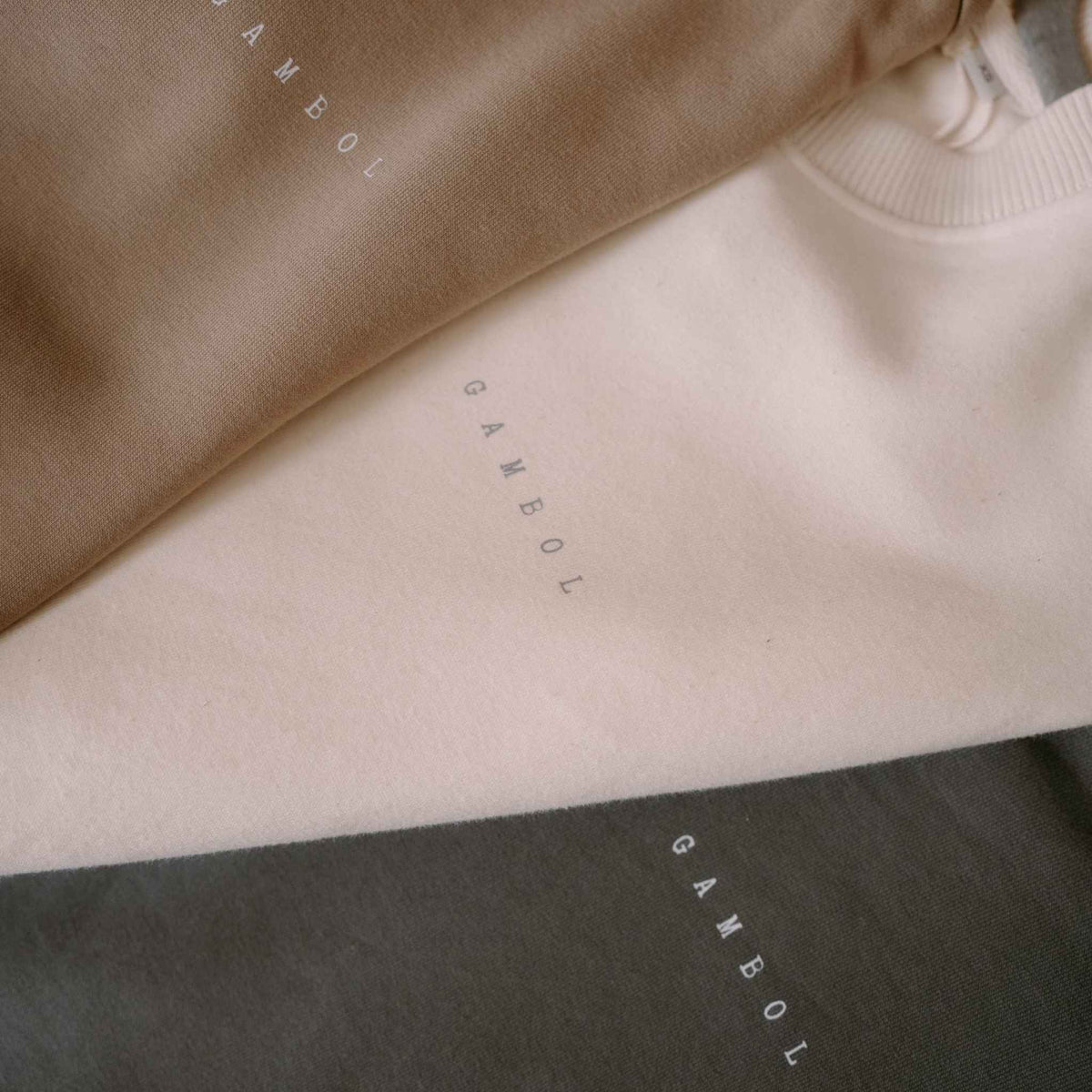 Gambol label close-up on organic cotton – Gambol Archive