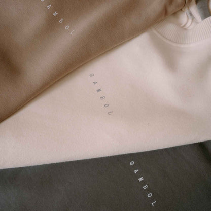 Gambol label close-up on organic cotton – Gambol Archive