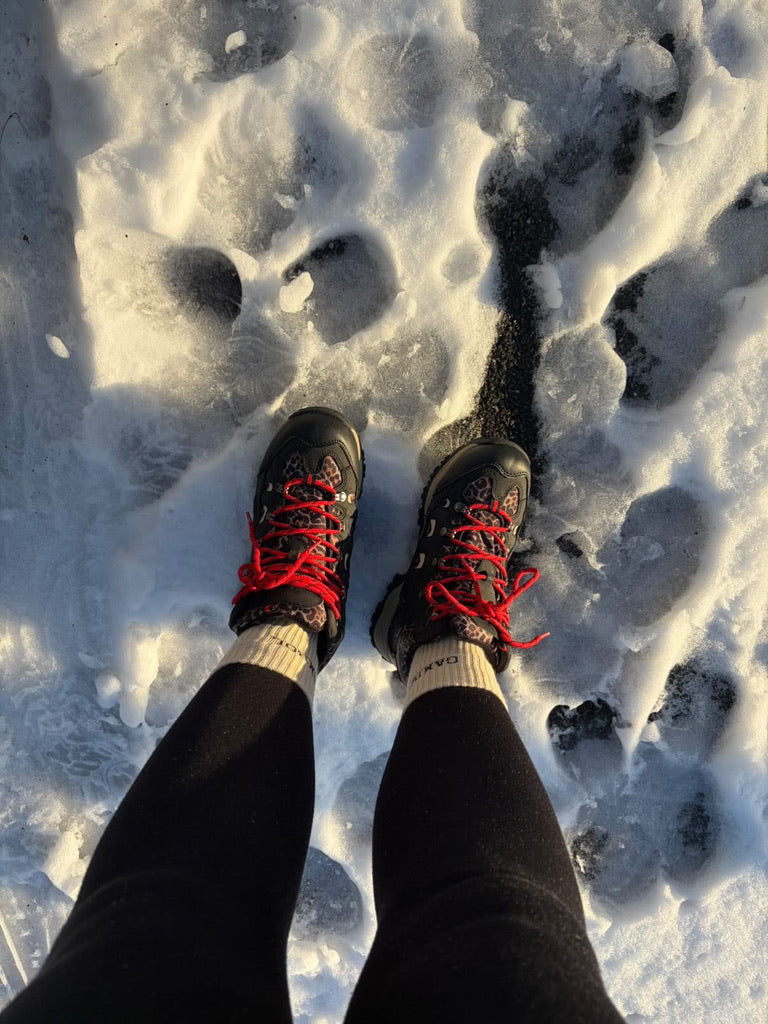 Gambol socks and walking boots in snow