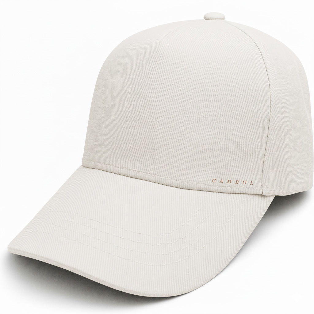 Beige baseball cap with 'Gambol' branding on a white background