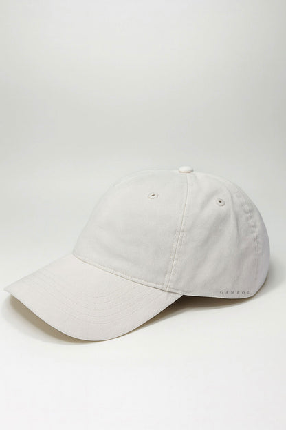 Light cream baseball cap on a white background