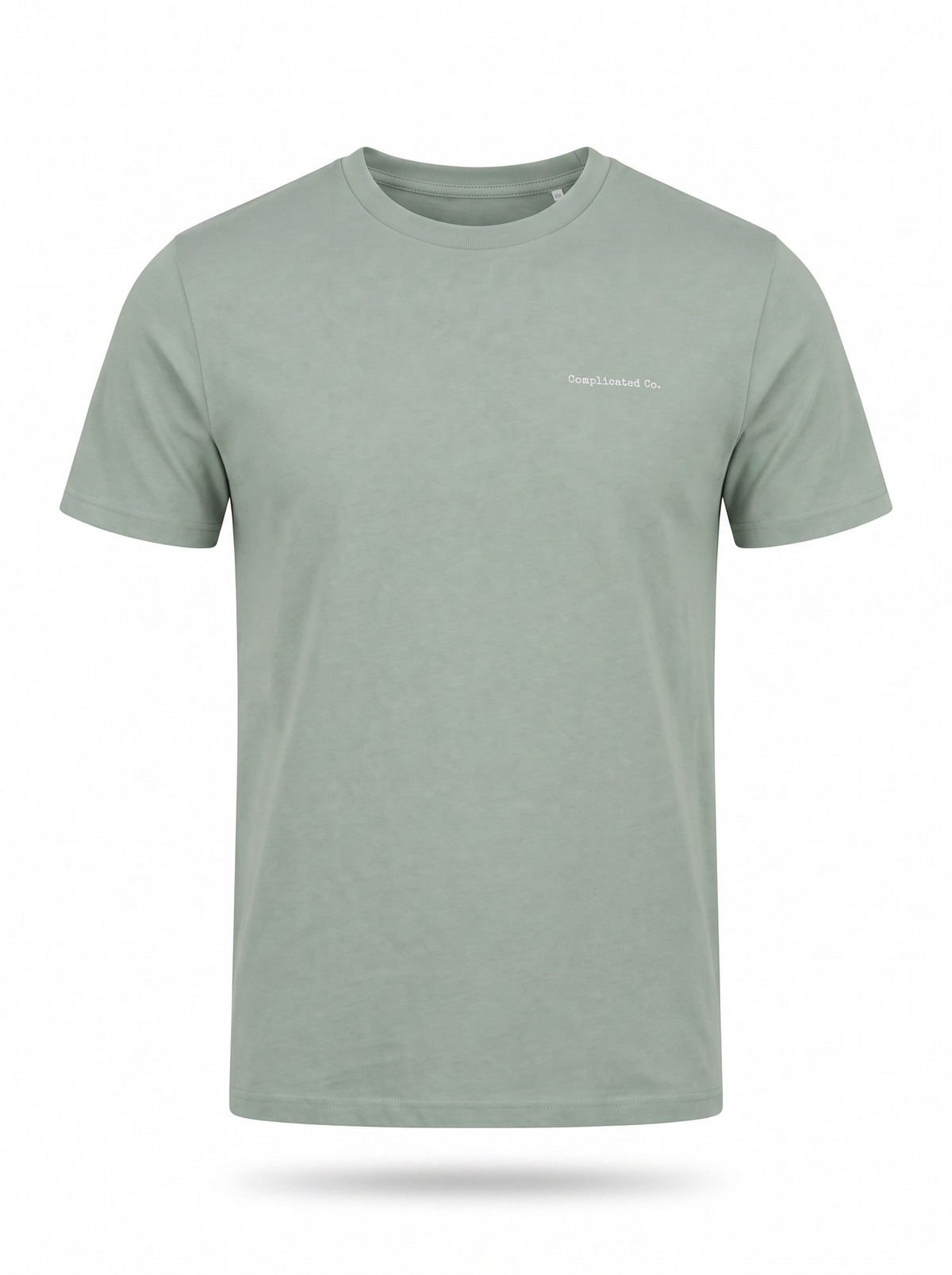 A light sage green crewneck t-shirt with a small white printed logo on the left chest, displayed on a clean white background with a soft drop shadow.
