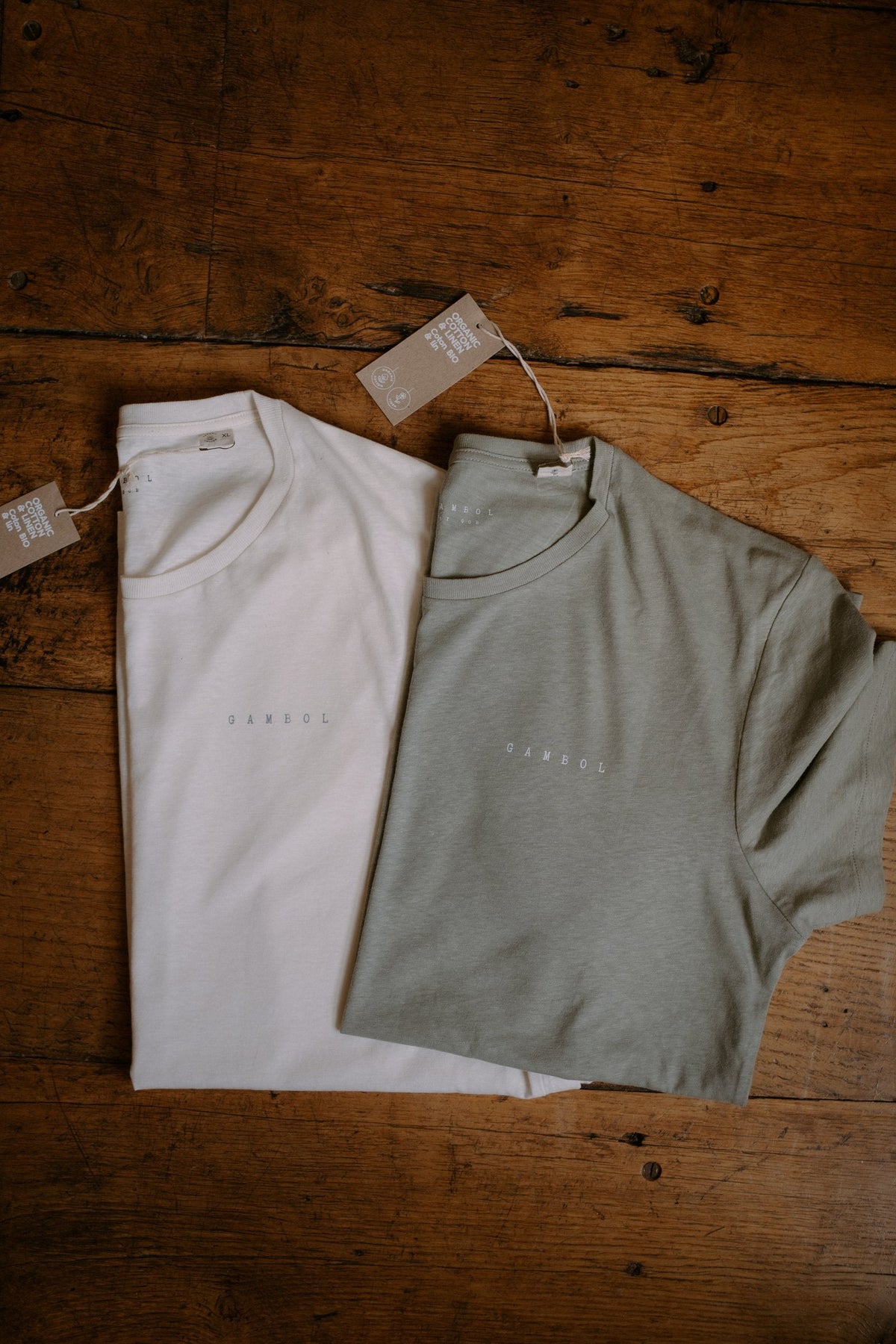 Everyday Tee in Ivory and Moss, folded – Gambol Archive