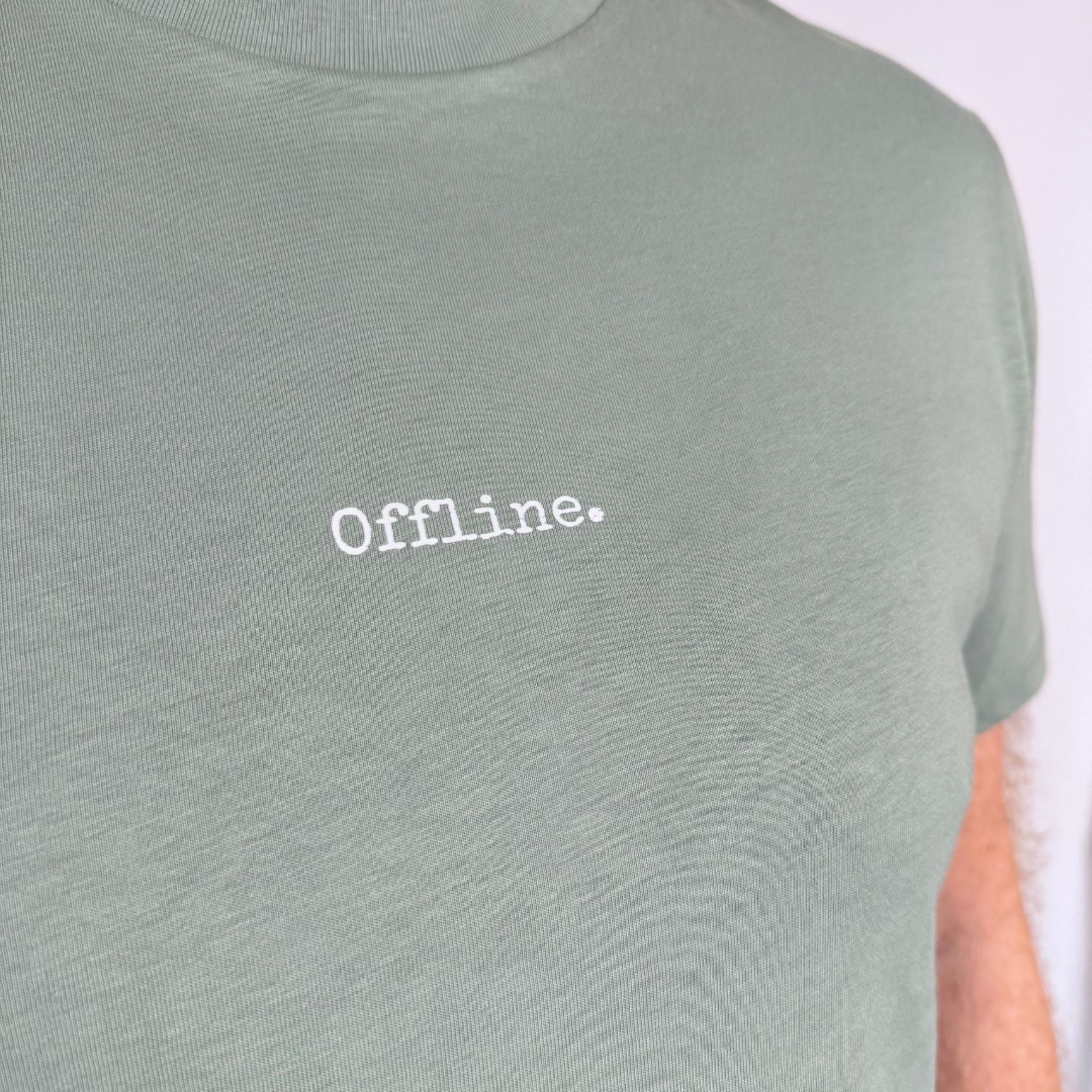 green t-shirt saying offline in white writing