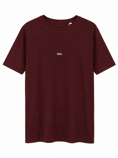 A dark cherry short-sleeve crewneck t-shirt with the word 'Bah.' A christmas t-shirt, women's relaxed fit t-shirt.