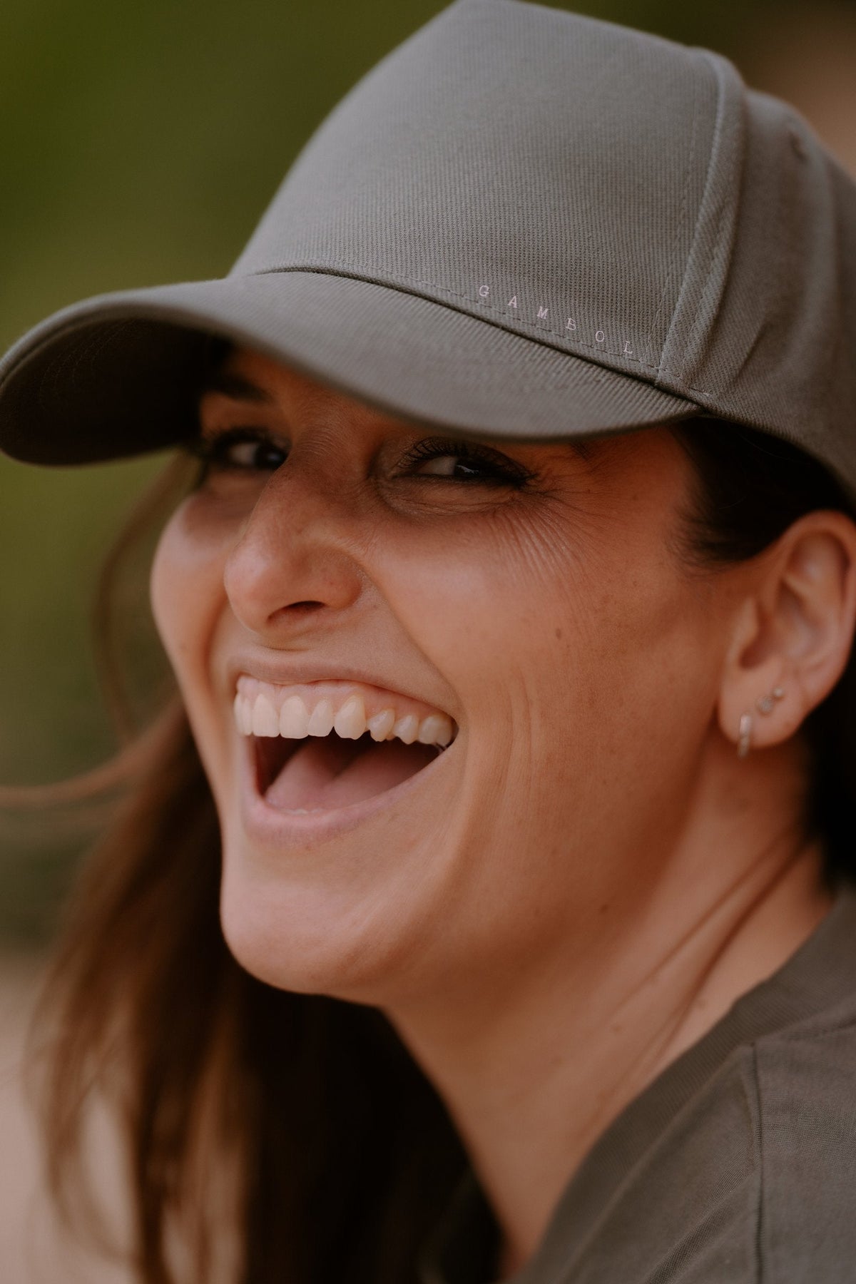 The Pace Cap in Khaki, worn