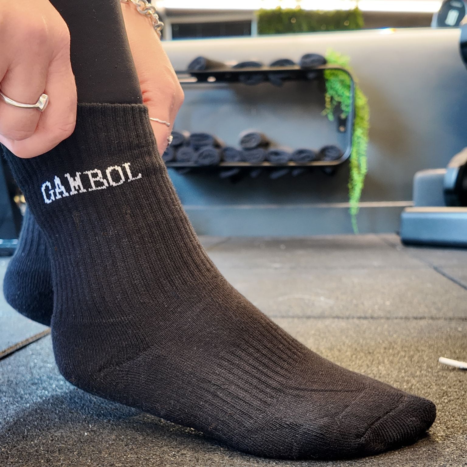 black socks that say 'Gambol'