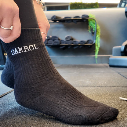 black socks that say 'Gambol'